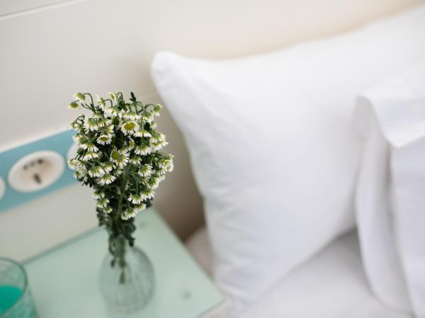 La Boutique Puerta Osario : photo 3 de la chambre chambre double avec lit d'appoint (2 adultes + 1 enfant)