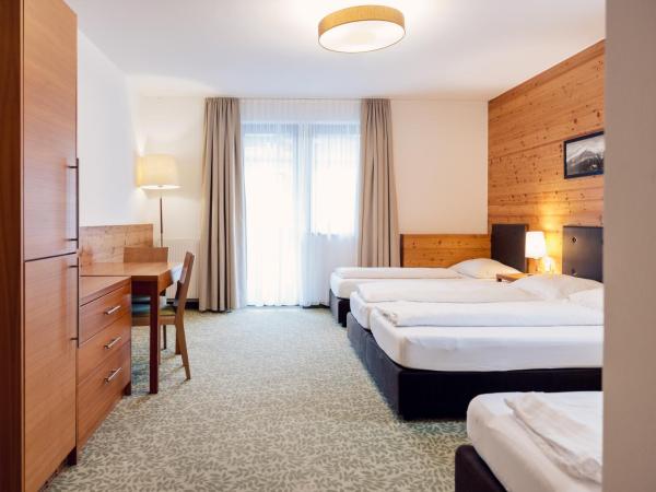 Hotel Bon Alpina : photo 2 de la chambre chambre quadruple