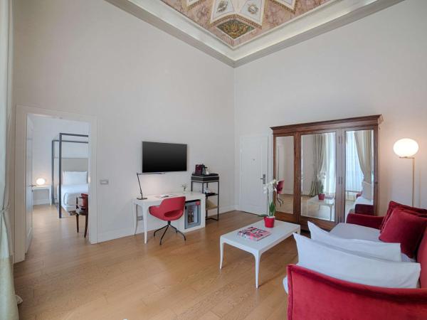 NH Collection Firenze Porta Rossa : photo 6 de la chambre chambre triple familiale