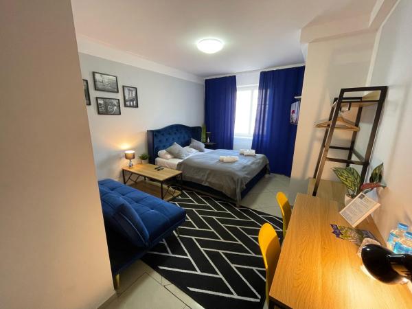 Great Polonia Wrocław City Center : photo 1 de la chambre chambre double avec lit d'appoint
