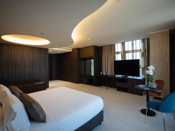 Gold Tower Lifestyle Hotel : photo 1 de la chambre chambre familiale deluxe