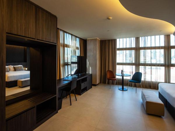 Gold Tower Lifestyle Hotel : photo 2 de la chambre chambre familiale deluxe