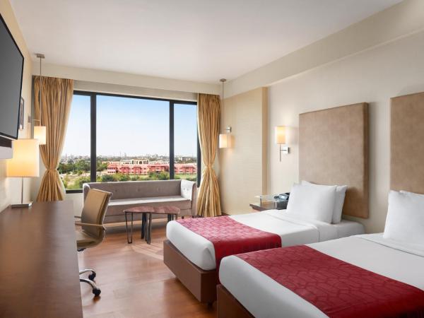 Ramada by Wyndham Jaipur North : photo 1 de la chambre chambre triple classique