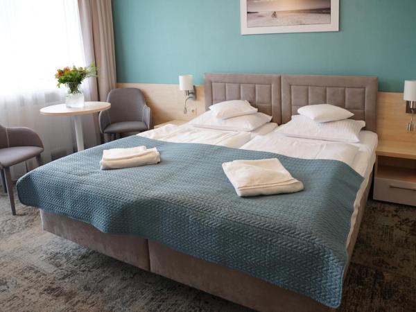 Apartamenty Nad Parsętą Szpitalna 7 : photo 3 de la chambre chambre double ou lits jumeaux