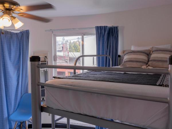 Esencia Hostel Terminal Oaxaca : photo 1 de la chambre lit simple dans dortoir pour hommes