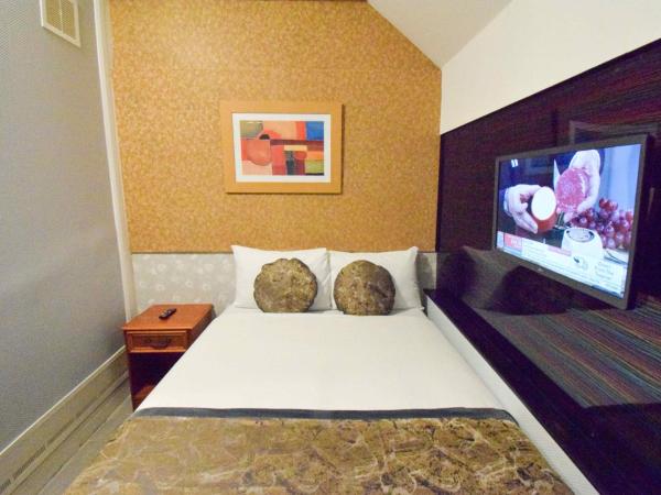 Pembridge Palace Hotel : photo 2 de la chambre chambre quadruple (sous-sol)