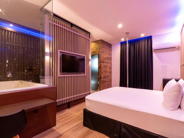 Drops Motel Manaus : photo 6 de la chambre suite deluxe avec baignoire spa