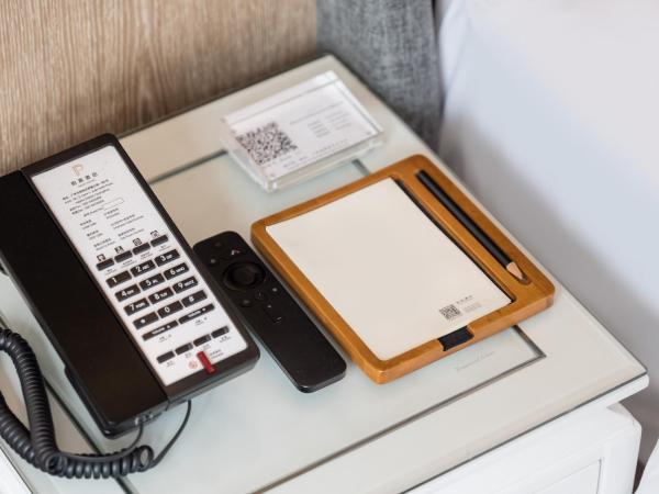 Paco Hotel Canton Tower Pazhou--FreeShuttle Bus for CantonFair : photo 7 de la chambre chambre lits jumeaux avec salle de bains