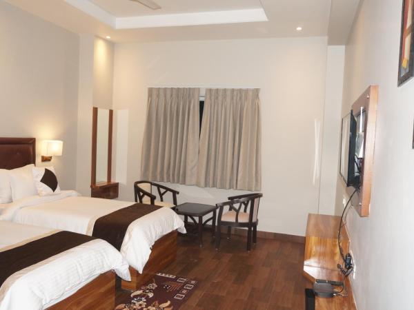 Neel Clarks Inn Express : photo 3 de la chambre chambre lits jumeaux deluxe