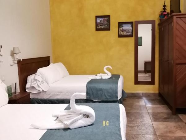 Casa Esmeralda Hotel : photo 3 de la chambre chambre double avec 2 lits doubles