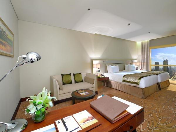 The Tower Plaza Hotel Dubai : photo 3 de la chambre chambre lit king-size supérieure sky