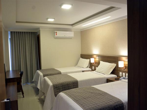 Pituba Praiamar Hotel : photo 2 de la chambre chambre triple exécutive