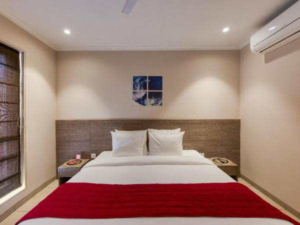 ROSASTAYS Gurugram Golf Course : photo 2 de la chambre chambre deluxe double ou lits jumeaux