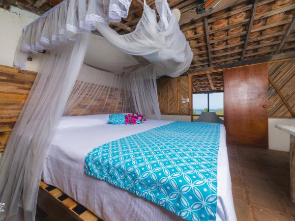 Casa de la Gente Nube : photo 3 de la chambre chambre lit king-size - vue sur mer