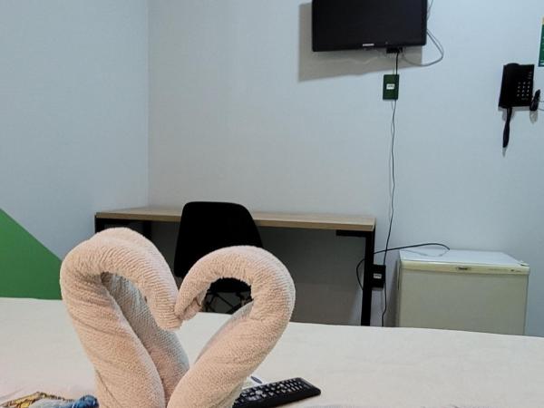 Maraca Hostel : photo 5 de la chambre chambre double ou lits jumeaux avec salle de bains commune