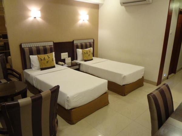 Hotel Suba Palace : photo 2 de la chambre cette chambre double ou lits jumeaux deluxe bénéficie d'une réduction de 10 % sur la nourriture, les boissons sans alcool et le service de blanchisserie par séjour.