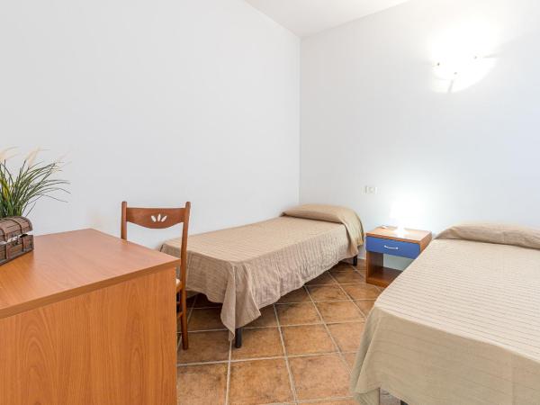 Le Dimore di Nettuno - Happy Rentals : photo 10 de la chambre appartement - vue sur piscine 