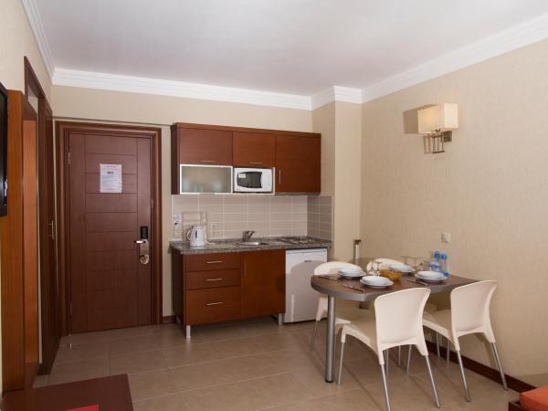 Club Aida : photo 5 de la chambre appartement (4 adultes)