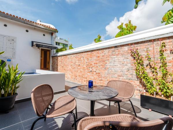 Tien Hotel Georgetown : photo 8 de la chambre suite avec cour