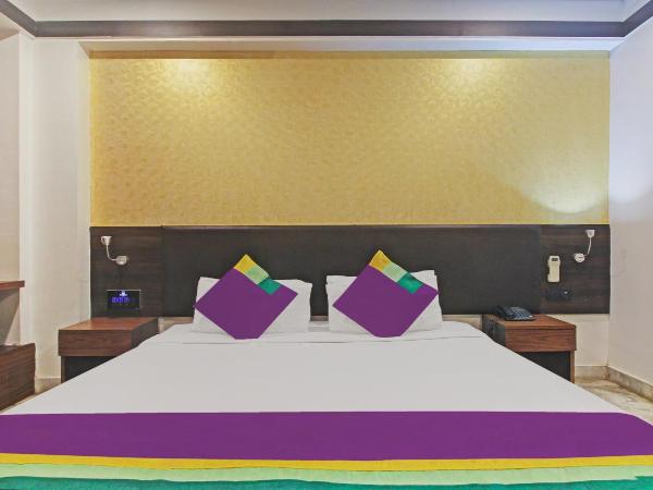 Treebo Premium Dee Empresa : photo 8 de la chambre chambre double standard