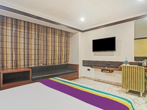 Treebo Premium Dee Empresa : photo 1 de la chambre chambre double deluxe