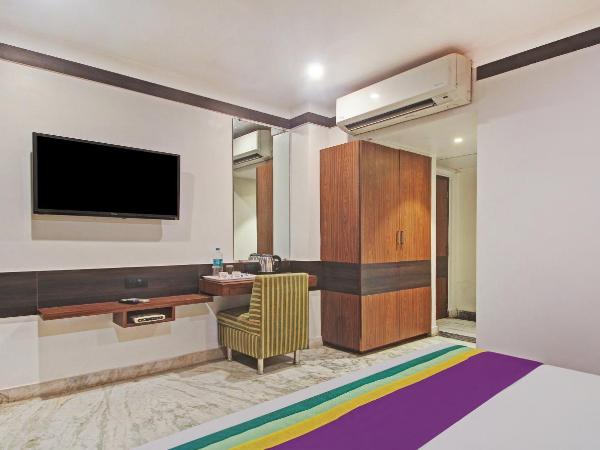 Treebo Premium Dee Empresa : photo 5 de la chambre chambre double deluxe