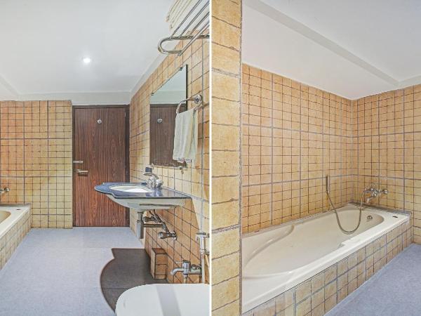 Treebo Premium Dee Empresa : photo 6 de la chambre chambre double deluxe