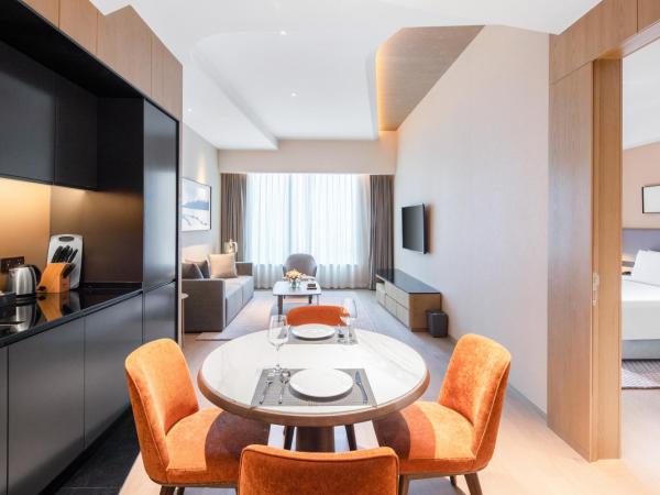 Primcasa Chengdu : photo 6 de la chambre chambre double avec balcon