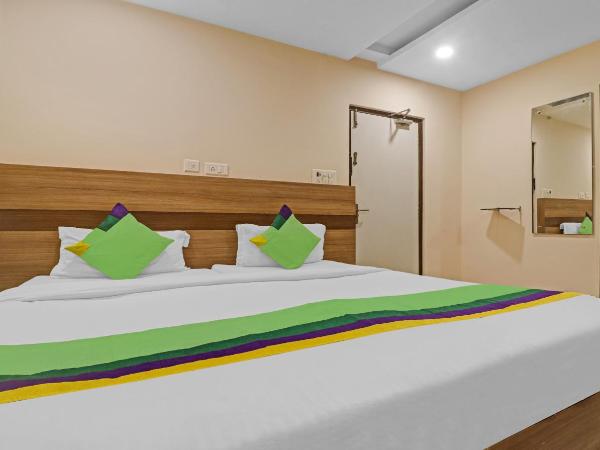 Treebo Pride Inn Botanica : photo 4 de la chambre chambre double standard