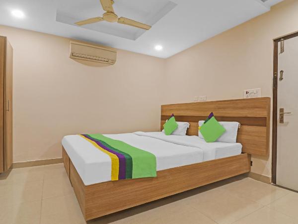 Treebo Pride Inn Botanica : photo 1 de la chambre chambre double standard