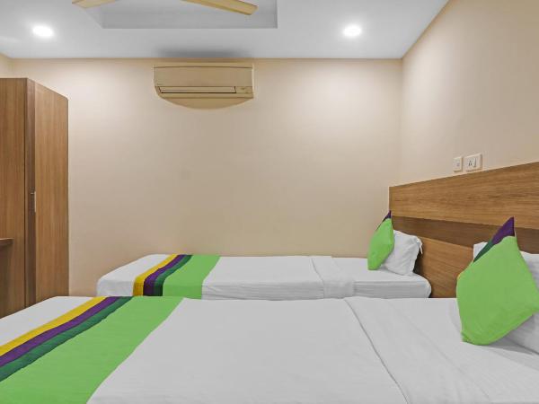 Treebo Pride Inn Botanica : photo 9 de la chambre chambre double standard