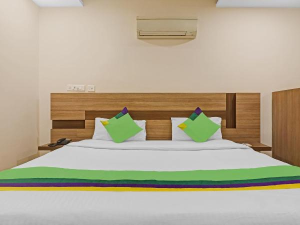 Treebo Pride Inn Botanica : photo 2 de la chambre chambre double supérieure