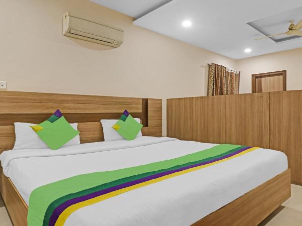 Treebo Pride Inn Botanica : photo 3 de la chambre chambre double supérieure