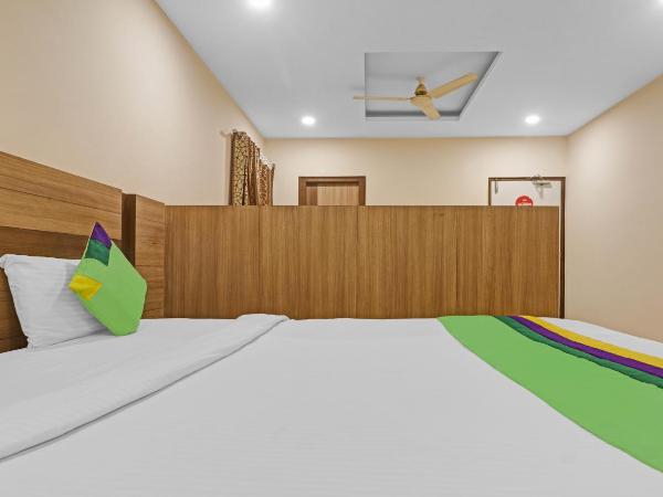 Treebo Pride Inn Botanica : photo 4 de la chambre chambre double supérieure