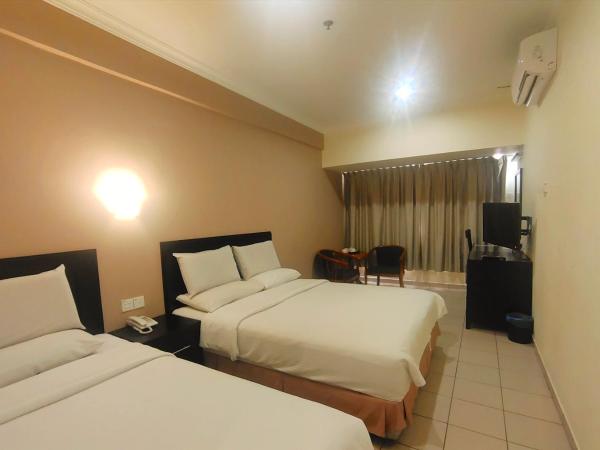 Megah D'aru Hotel : photo 4 de la chambre chambre familiale