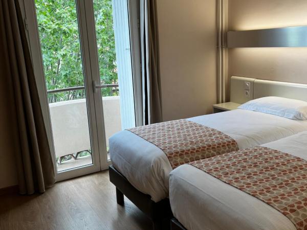 Hôtel Mondial : photo 1 de la chambre chambre lits jumeaux