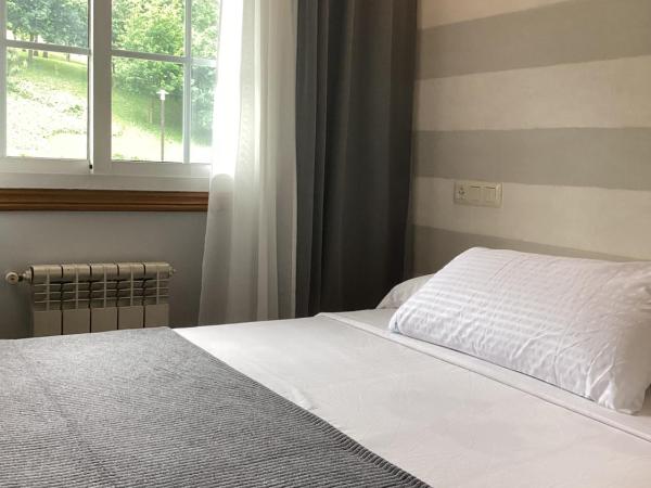 Saudade Hostal Cafetería : photo 10 de la chambre chambre double