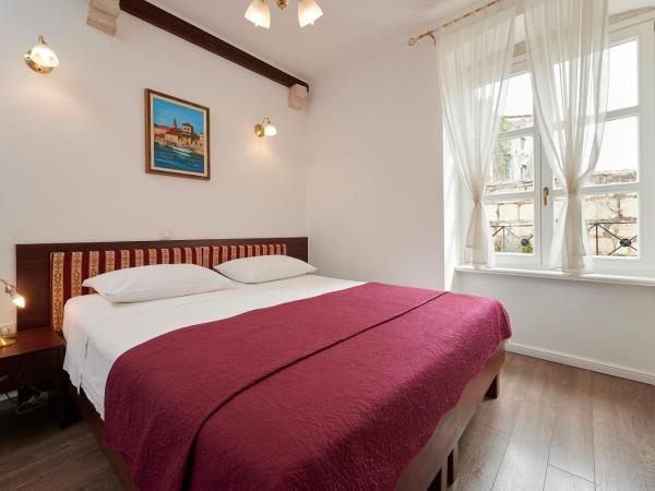 Palace Central Square : photo 1 de la chambre chambre double ou lits jumeaux