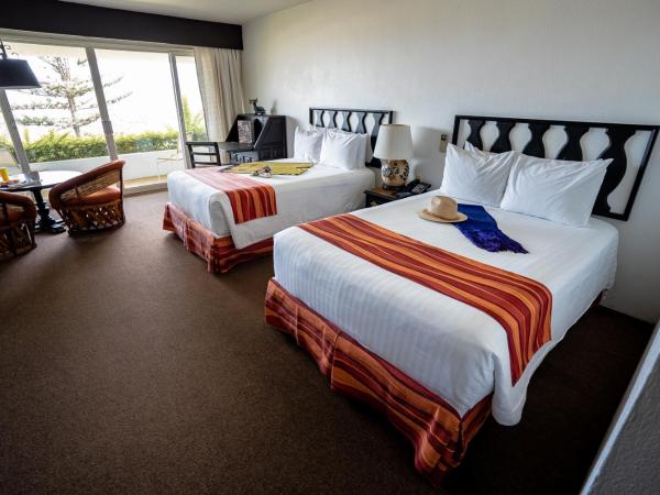 Hotel Victoria Oaxaca : photo 1 de la chambre chambre double supérieure avec deux lits doubles