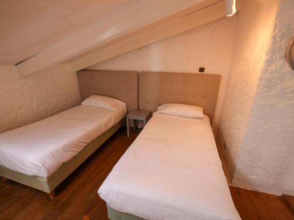 Hôtel Casa Rossa & Spa : photo 5 de la chambre chambre quadruple