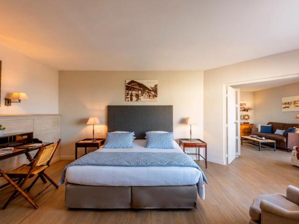 Hôtel La Réserve : photo 1 de la chambre suite double ou lits jumeaux