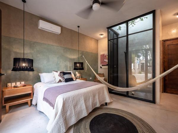 Casona Origen Merida : photo 1 de la chambre chambre supérieure lit queen-size