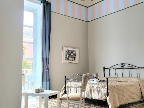 varcOrtigia Bed and Breakfast : photo 6 de la chambre chambre triple avec balcon