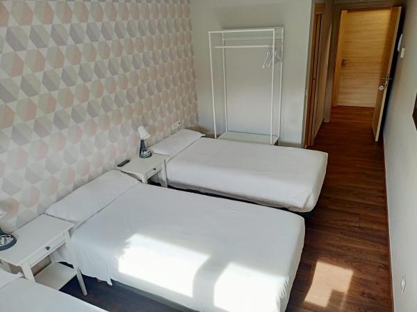 Pensión Boutique AdMera Cerca hospital Clínico : photo 8 de la chambre chambre triple