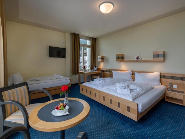 Arenas Resort Victoria-Lauberhorn : photo 2 de la chambre chambre triple