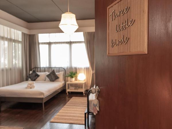 A Day Villa Chiangmai : photo 2 de la chambre chambre triple avec balcon