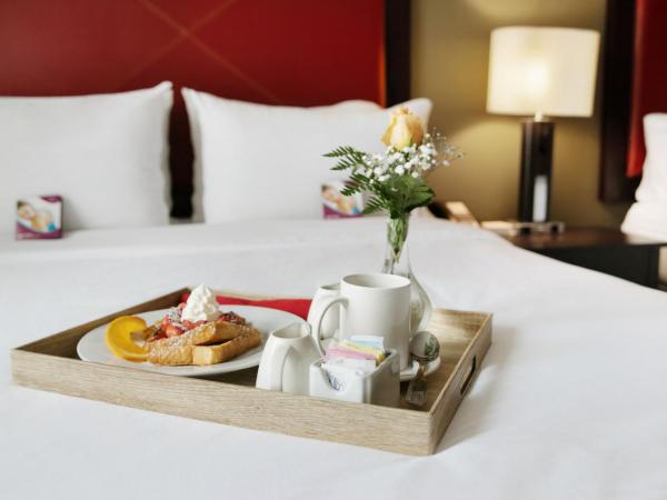 Crowne Plaza Houston Galleria Area, an IHG Hotel : photo 5 de la chambre suite 1 chambre lit king-size avec canapé-lit