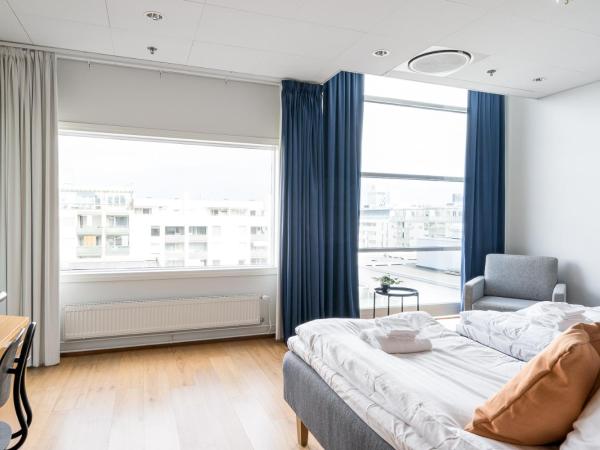 Hiisi Hotel Helsinki Jätkäsaari : photo 4 de la chambre chambre quadruple