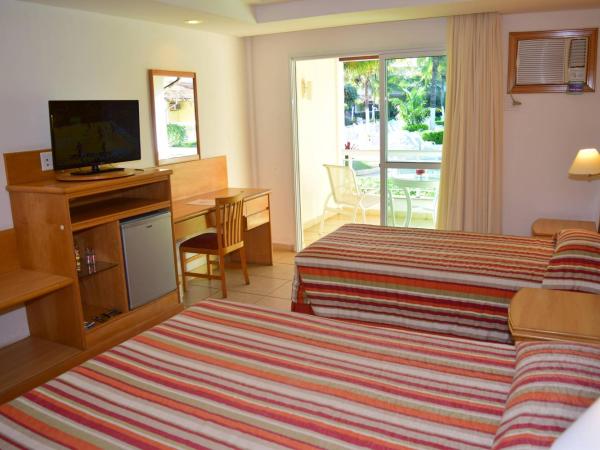 Hotel Atlântico Búzios Convention : photo 4 de la chambre chambre triple de luxe - vue sur piscine