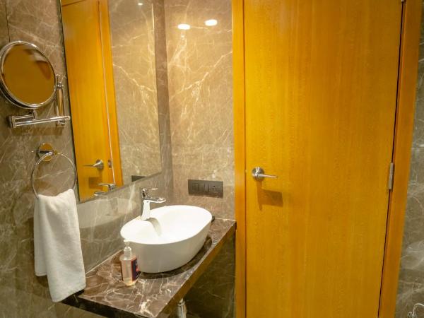 Zip By Spree Hotels Chakan : photo 6 de la chambre chambre deluxe double ou lits jumeaux